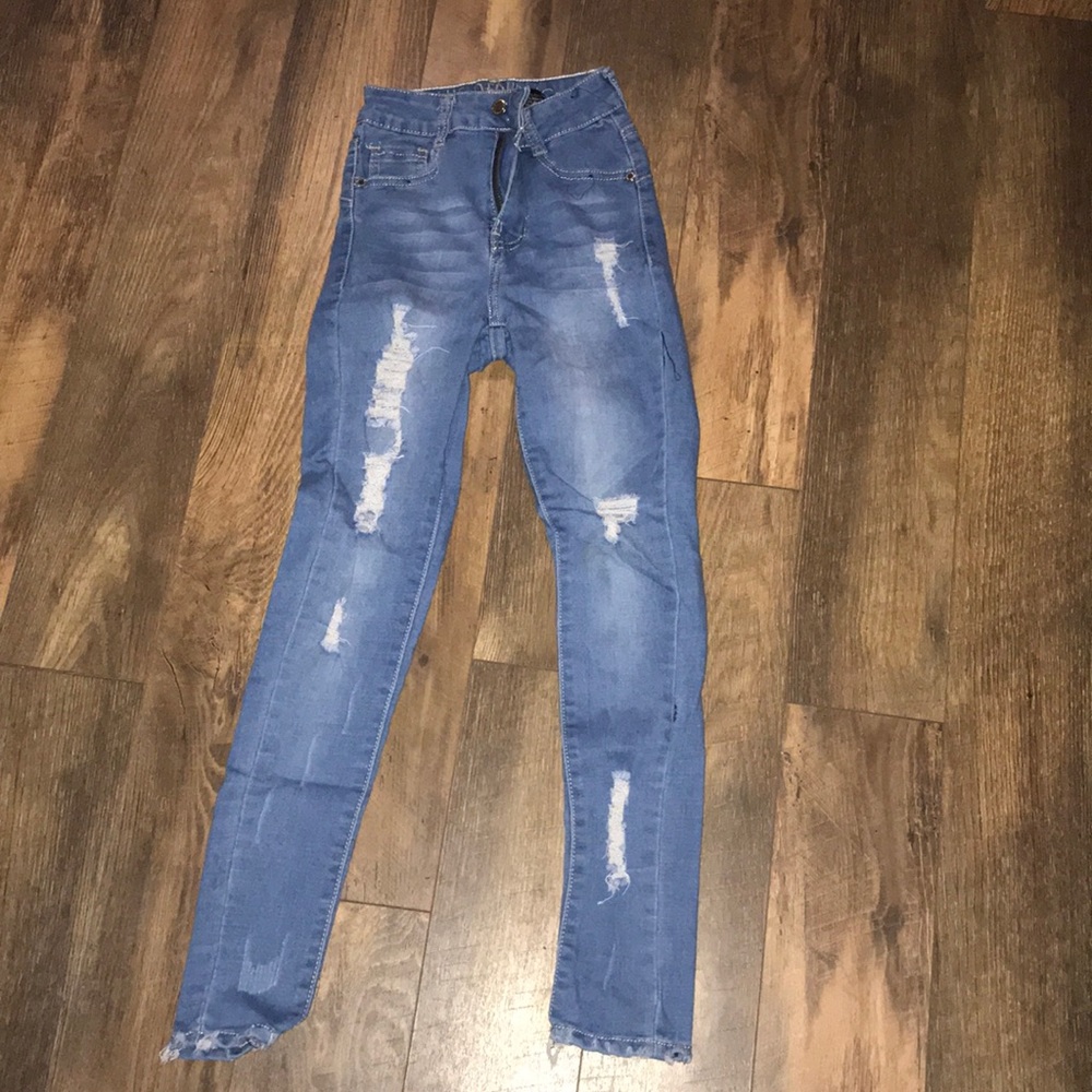 blue ripped jeans